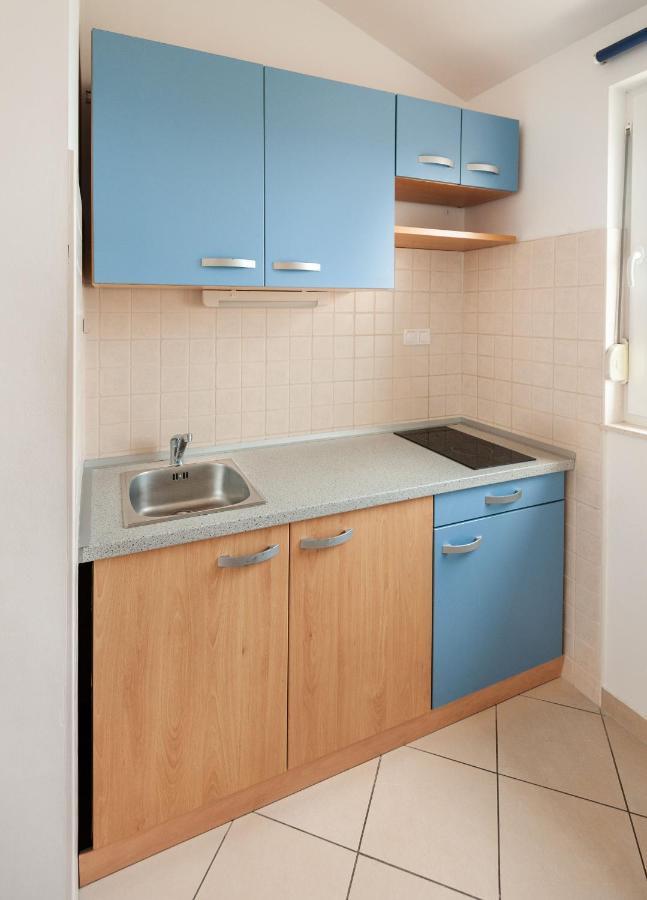 Apartments Lumaduma Трогир Экстерьер фото